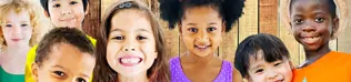 Group of children smiling.