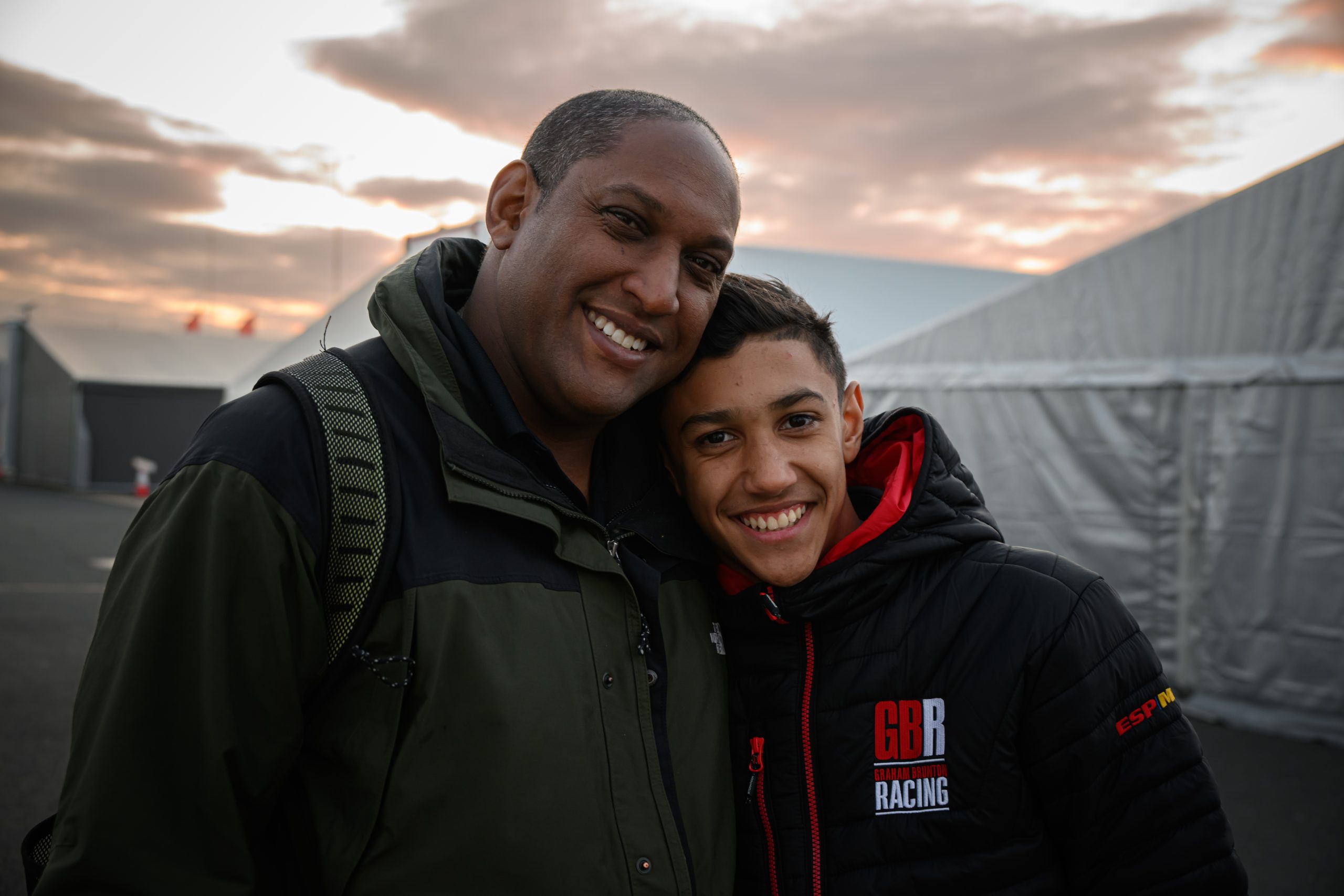 Mayer with his Dad, Clive Deonarine Mayer smiling with his father