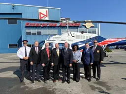 A group standing in front of a police helicopter at Enterprise Airlines in Oshawa. From left to right: Peter Moreira, Chief of Police, Durham Regional Police Service; Peter Bethlenfalvy, MPP for Pickering-Uxbridge; John Henry, Regional Chair and CEO of Durham Region; Lorne Coe, MPP for Whitby and Parliamentary Assistant to the Premier, Patricia Barnes, MPP for Ajax; Todd McCarthy, MPP for Durham; Andrew Tummonds, President of The Durham Regional Police Association.