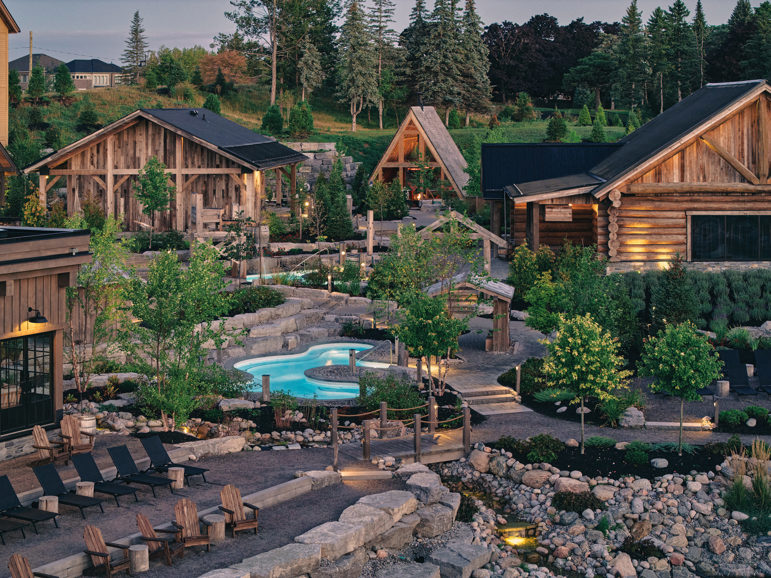 Drone shot of saunas, pools and greenery at Thermea Spa.