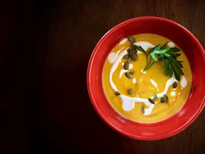 Pages-Platefuls---Spicy-Thai-Inspired-Carrot-Soup-with-Carrot-Top-Salsa-Verde.png