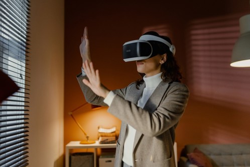 Person using a VR headset indoors