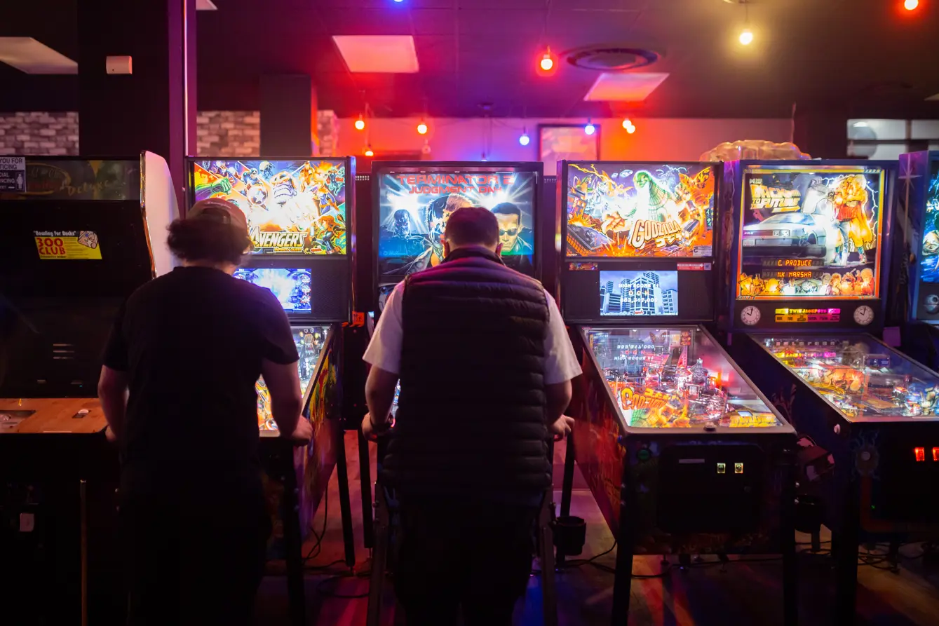2022---8-Bit-Beans---Two-Kids-Playing-Pinball.jpg
