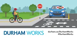 An animated image of a car with a person driving stopped at a stop sign, with a child on a bike crossing the street. Text states: Durham Works, durham.ca/DurhamWorks, #DurhamWorks.