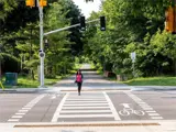 A women walking through a mixed crossride