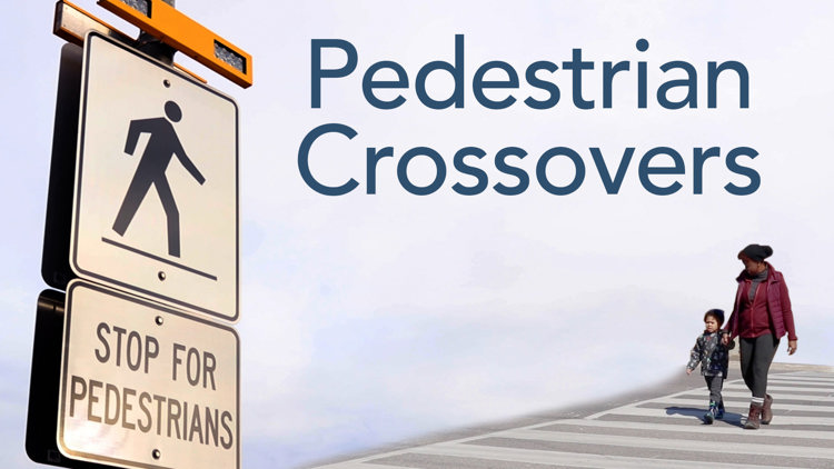 Image shows a mother and son walking across a pedestrian crossover painted on the road with thick white stripes, along with a road sign that says “Stop for pedestrians” and text over the image that states “Pedestrian Crossovers.