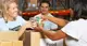 Volunteers work together to pack food at a food bank