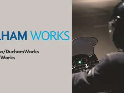 Close-up stock image of a motorcyclist. Text states, “Durham Works. Durham.ca/DurhamWorks #DurhamWorks”