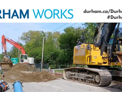 Image of a road construction project. Text over image states: “Durham Works, durham.ca/DurhamWorks #DurhamWorks.”